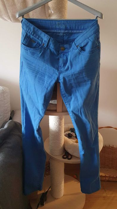 Niebieskie spodnie jeansy rurki slim fit Orsay 38