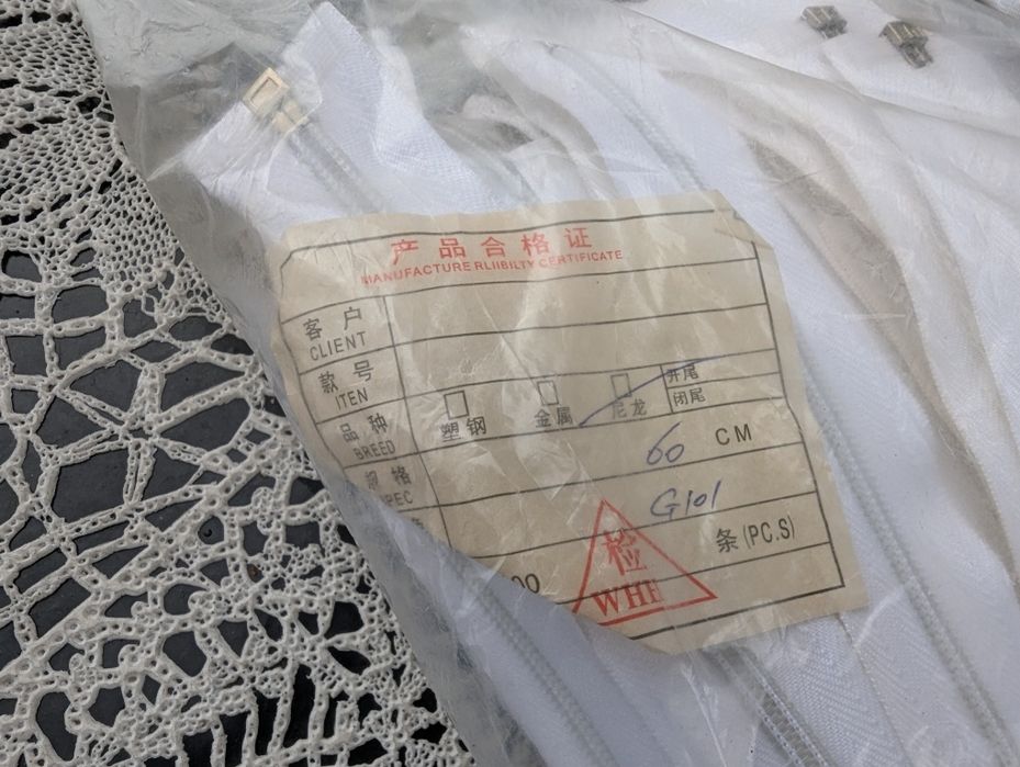 Zamki błyskawiczne 60, białe 100szt