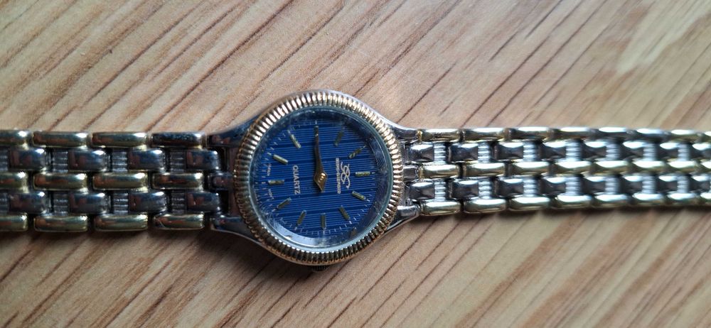 Relógio Seiko bicolor prateado dourado mostrador azul