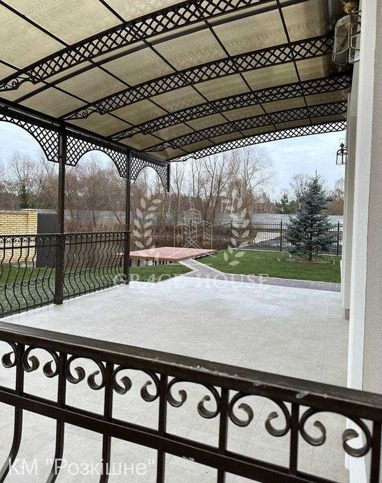 Новий котедж на БЕРЕЗІ ОЗЕРА з РЕМОНТОМ, з охороною у КМ. с. Романків