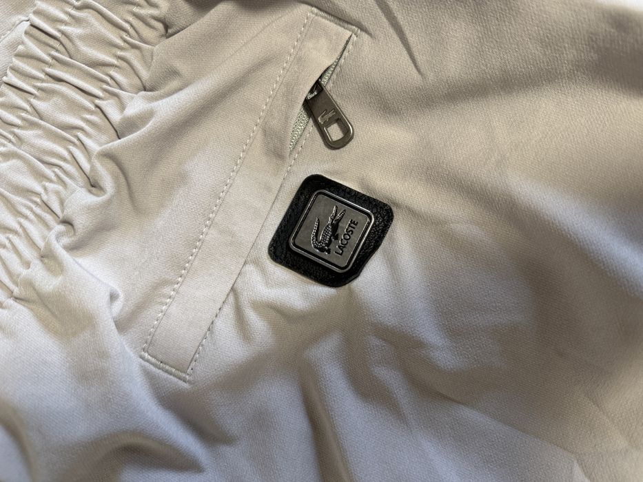 Брюки LACOSTE.