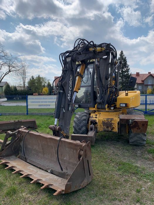 Usługi sprzętem budowlanym koparka, koparko-ładowarka