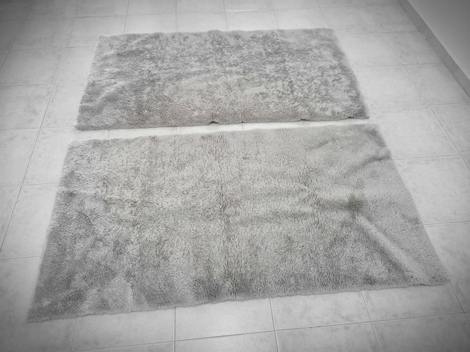 2 tapetes creme de 160x85 cms