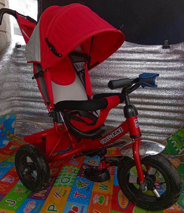 Продам детский музыкальный велосипед-коляска Lamber trike почти новый.