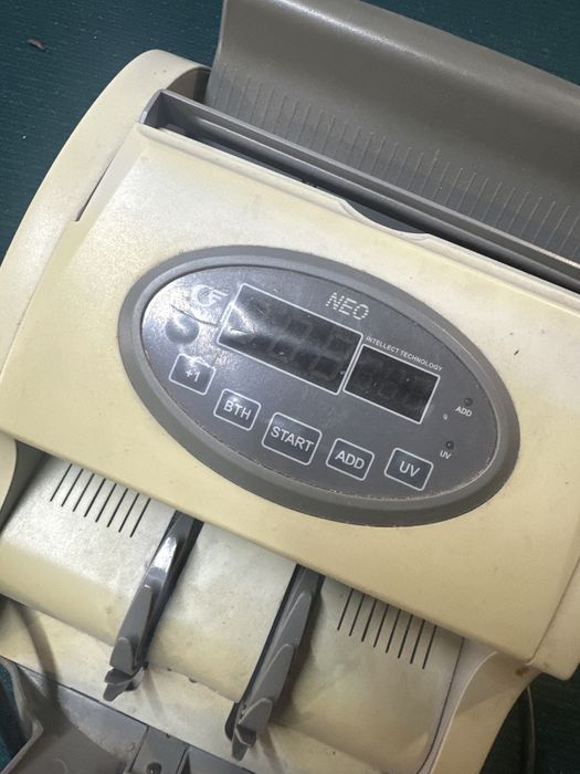 Машинка для рахування гривні