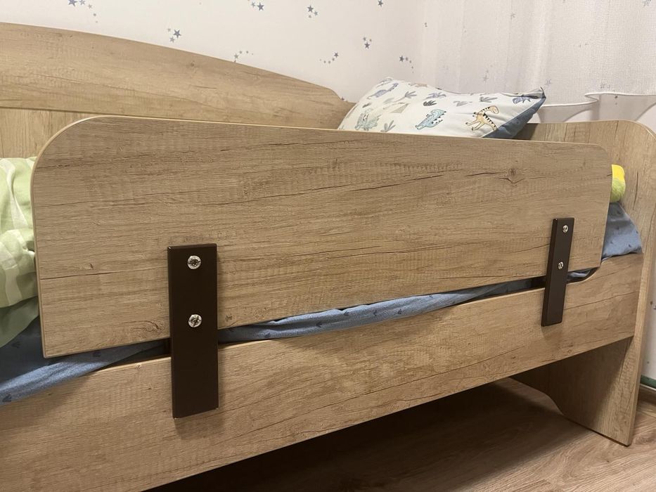 Захисний бортик для дитячого ліжка