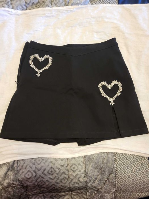 Saias calções pretas novas
