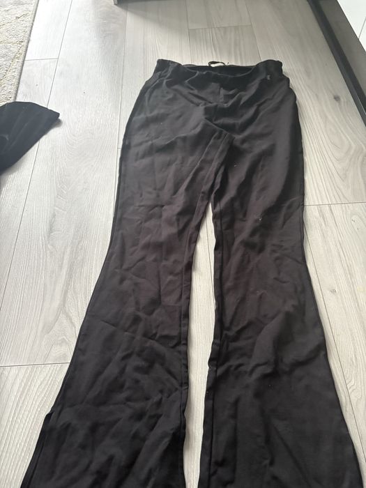 L 40 calvin klein czarne spodnie legginsy rozciecia ck
