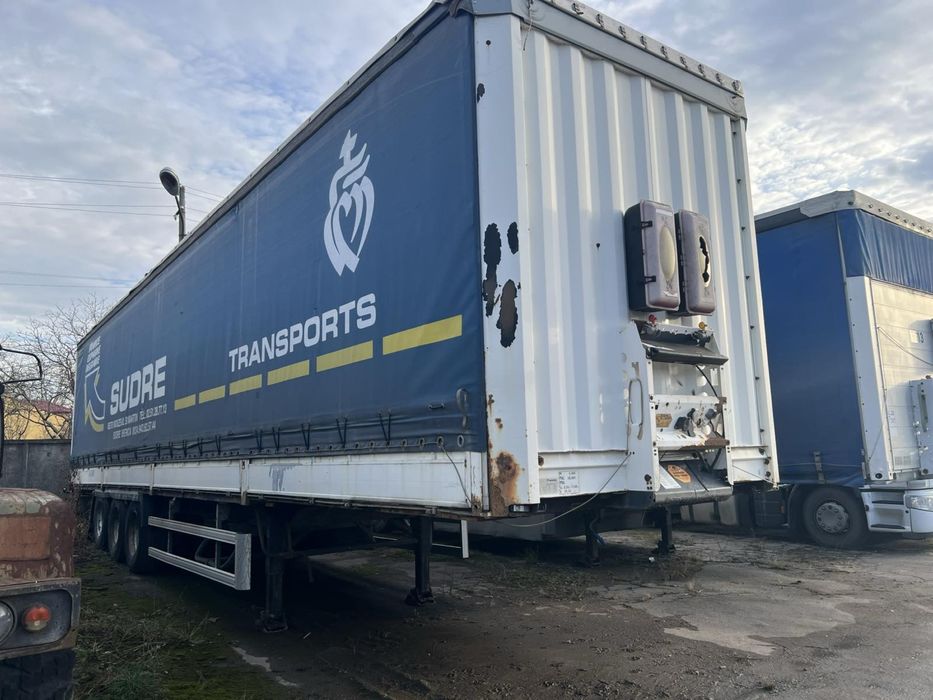 Бортовий напівпричіп Кроне