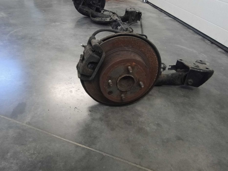 Балка задня Nissan TIIDA Versa 2007-2012р. 55501EM10B,55501EM30A