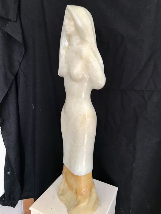 Escultura em pedra onix