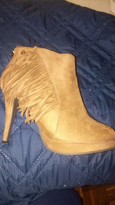 Botas botins novos XTI