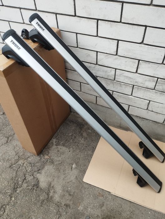 Багажник Thule 7104 Raised Rail WingBar Evo на рейлинги.
