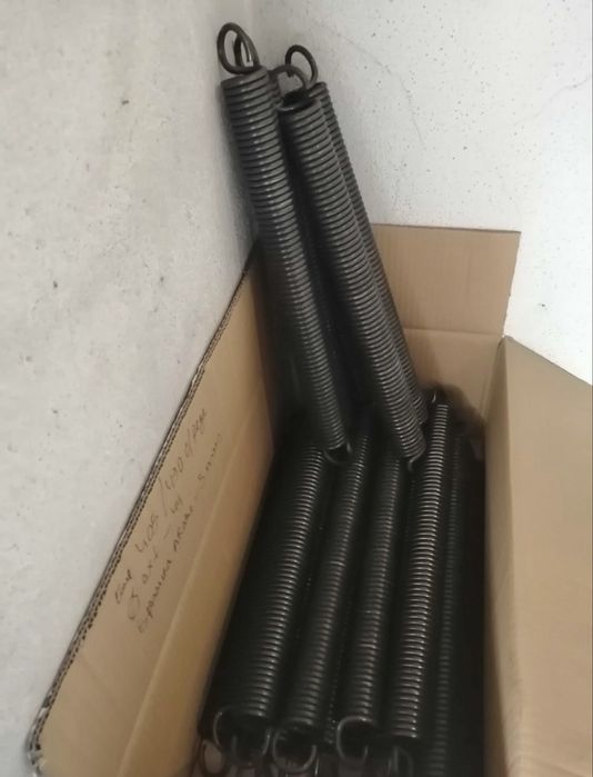 Mola em aço para porta basculante