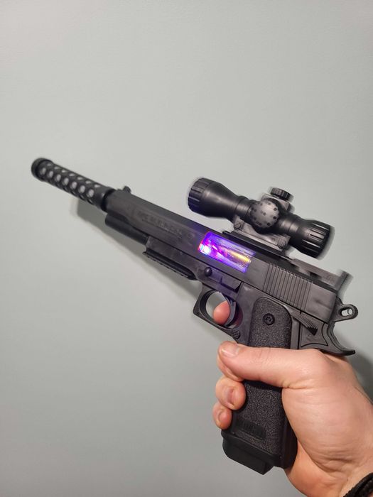 Pistolet broń led na baterie