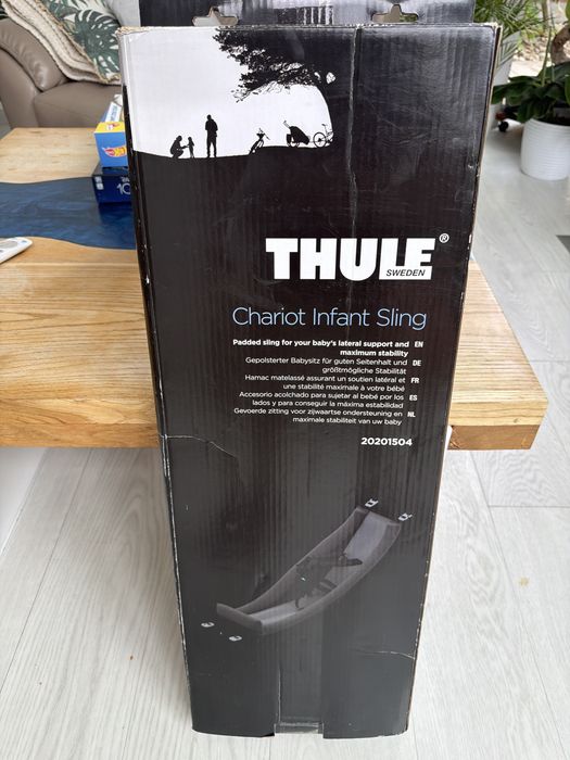 Thule Chariot Infant Sling 20201504 – stan bardzo dobry  Sprzedam oryginalny hamak/wkładkę dla niemowląt do przyczepek Thule Chariot