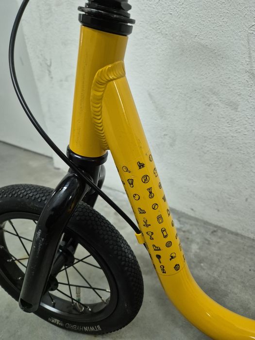 Bicicleta de aprendizagem criança amarelo BTWIN