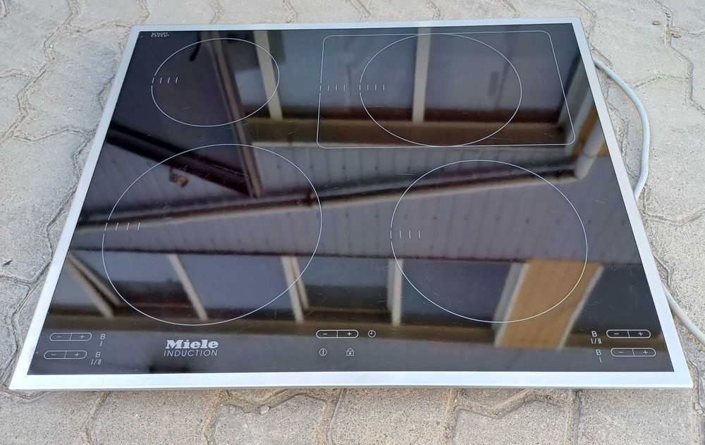 Вбудована варильна поверхня індукційна 60 см Міле Miele KM 6115 бустер б/в встраиваемая индукционная поверхность плита Миле б/у