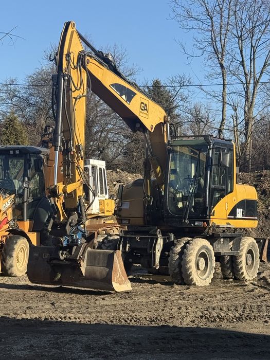 Koparka cat 313c Rototilt