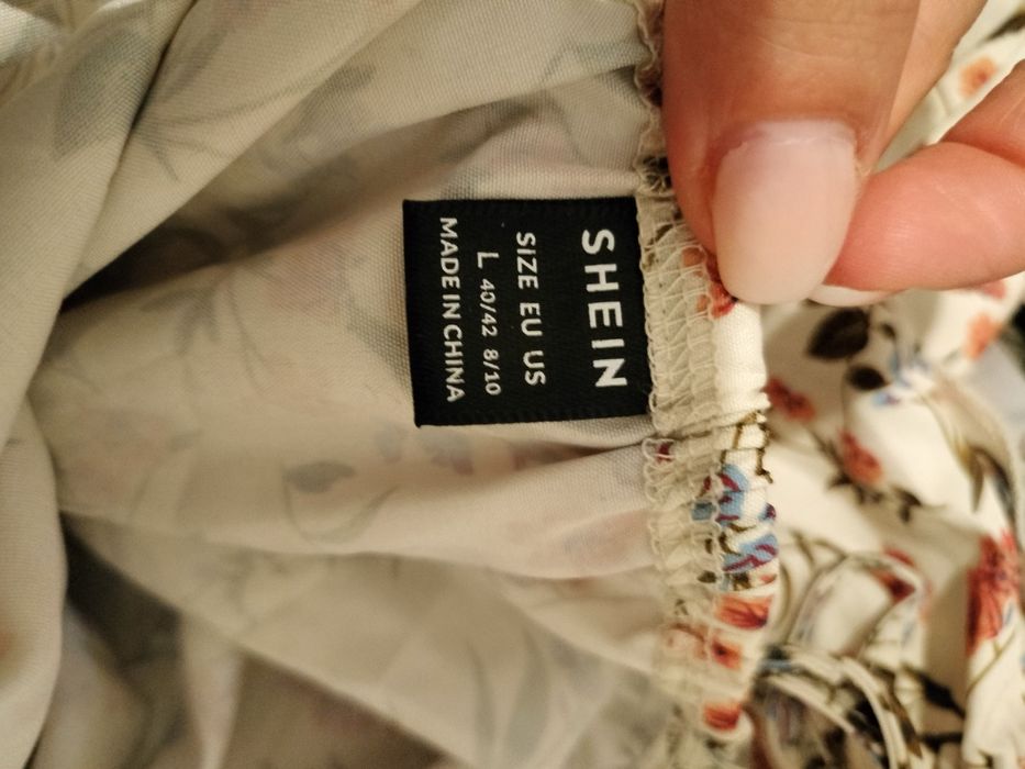 Macacão florido beje