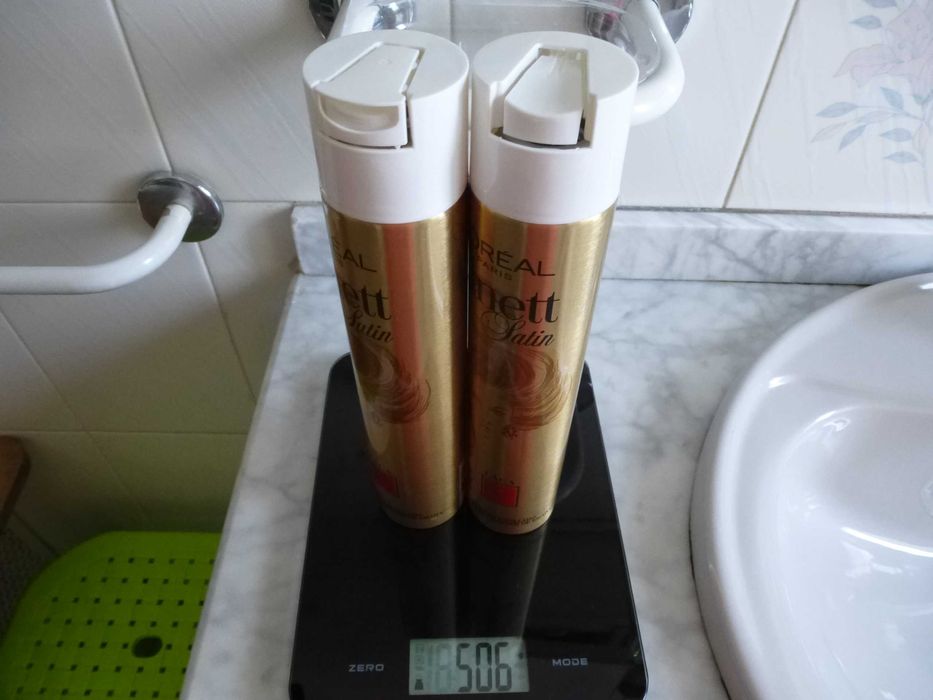 Laca para cabelo e pedra de afiar navalhas