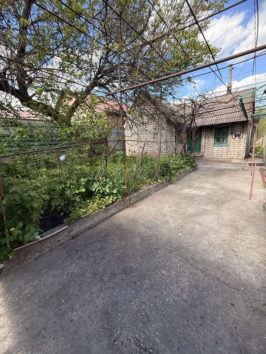 Ділянка із будиночком у Шевченківському мкрн.