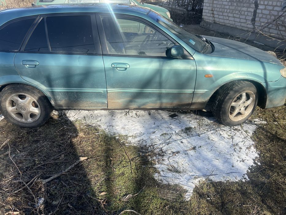 Мазда 323 f газ бензин