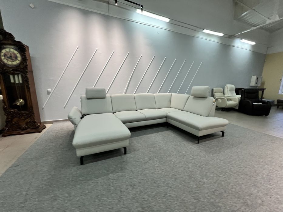 Виставковий новий шкіряний розкладний диван реклайнер