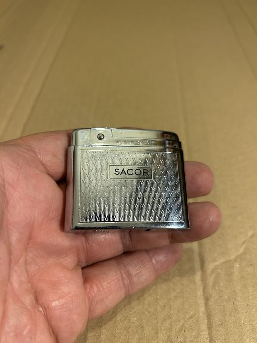 Sacor isqueiro antigo metal cromado raro