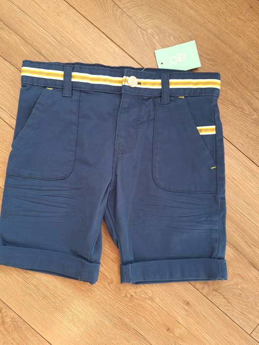 Eleganckie krótkie spodenki granatowe okaidi rozm 104