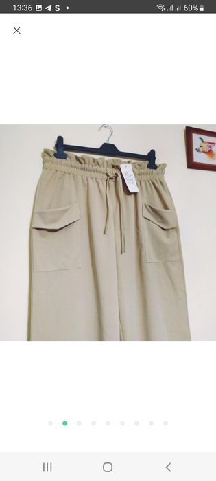 Укороченые брюки немного стрейчевые .