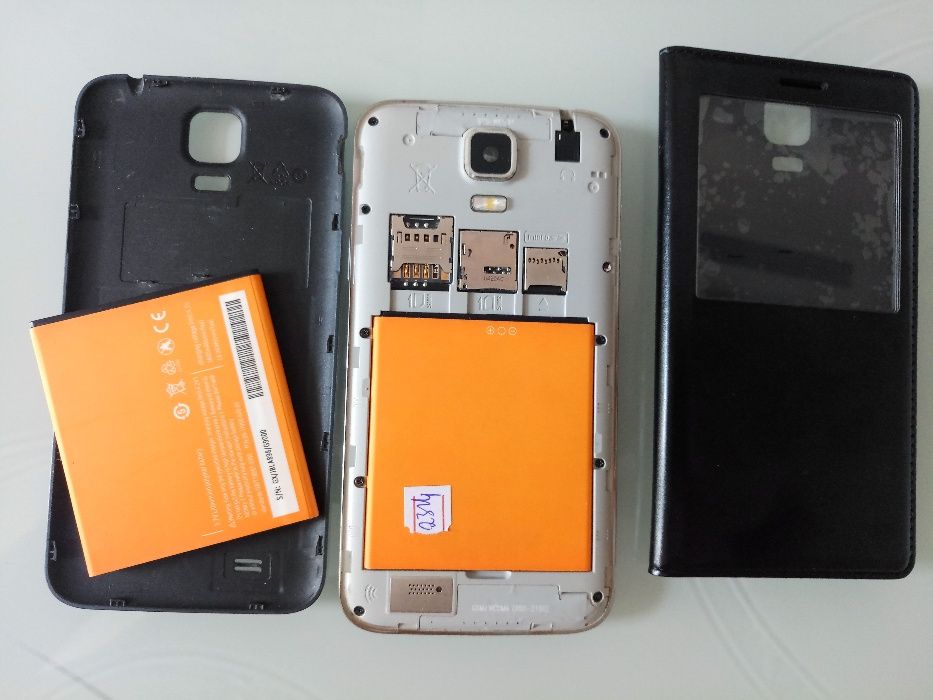 Не робочий телефон SAMSUNG S5 ,2 батареї, зарядка, чохол-футляр