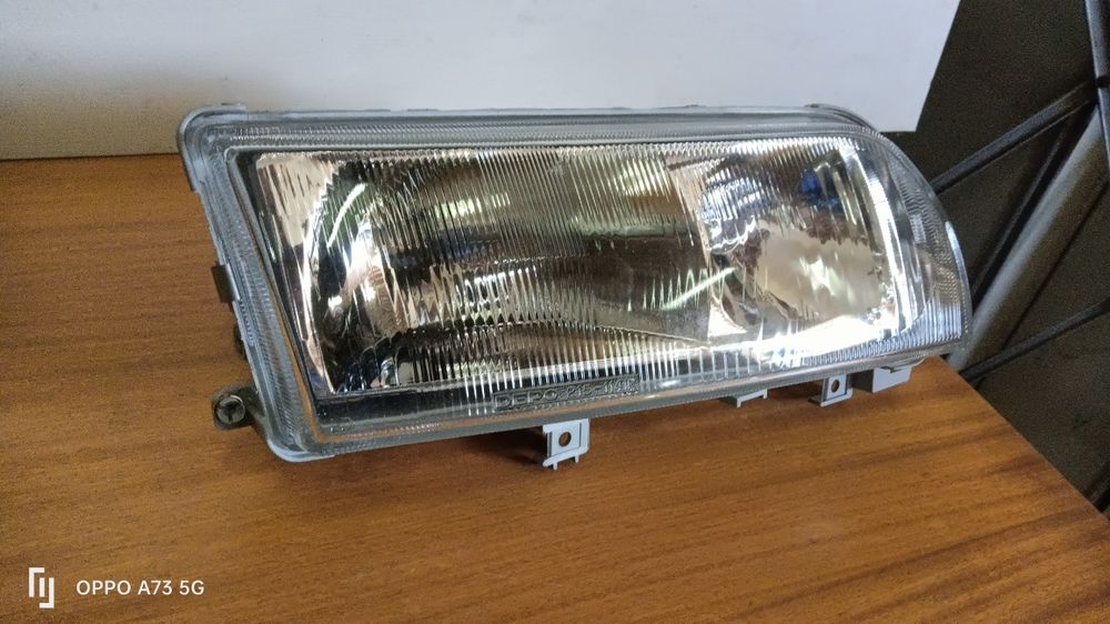 Farol Nissan Primera ótica 1990 direita