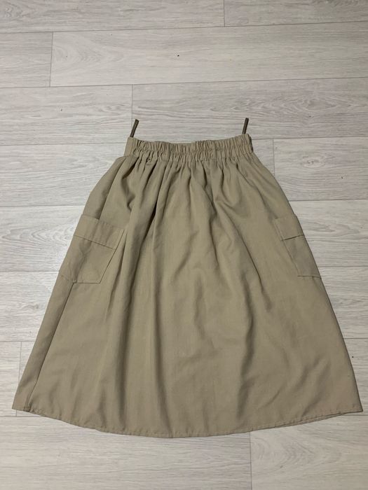 Довга спідниця з кишенями