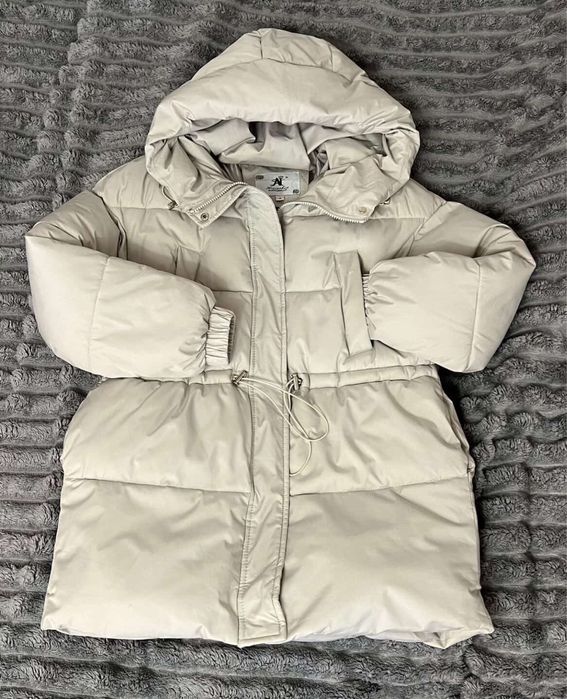 Тепла пухова куртка