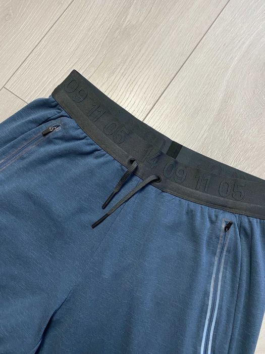 NIKE r.S oryginalne spodnie biegowe męskie