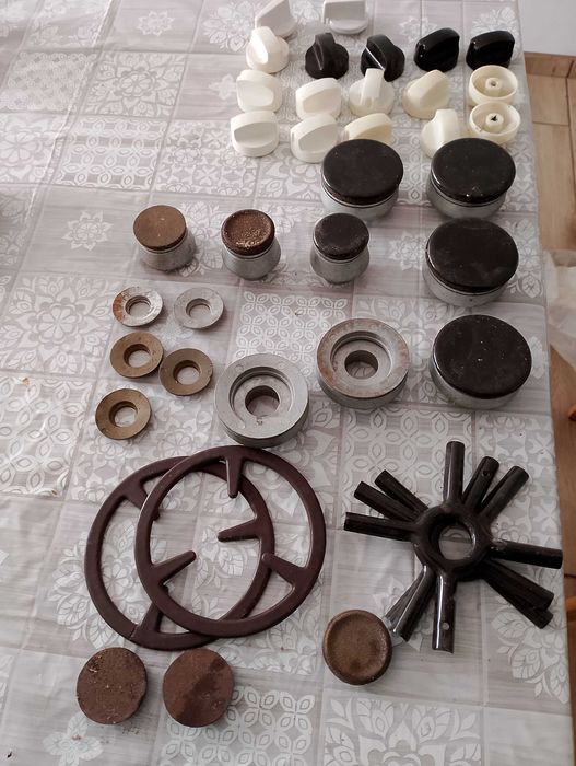 Palniki do kuchenki oraz pokrętła,podstawki