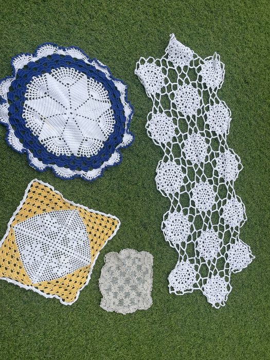 Various small crochet doilies
