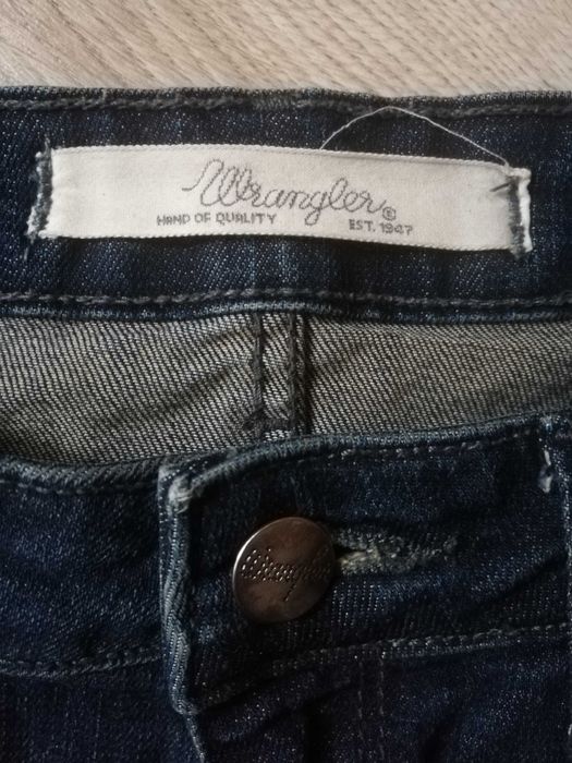 Jeansy Wrangler W28L34