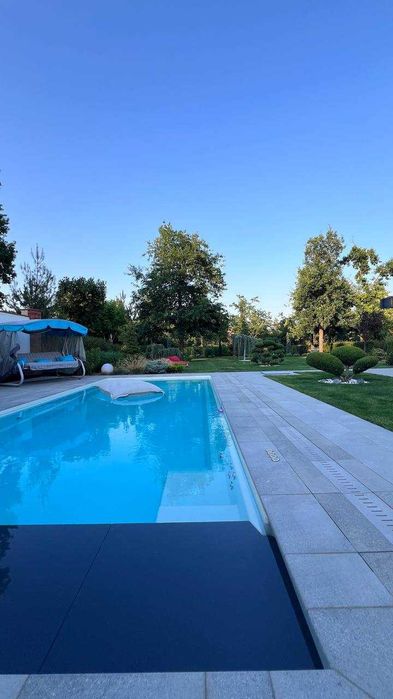 Продажа одноэтажного дома с бассейном и ремонтом в Сосновом Береге.