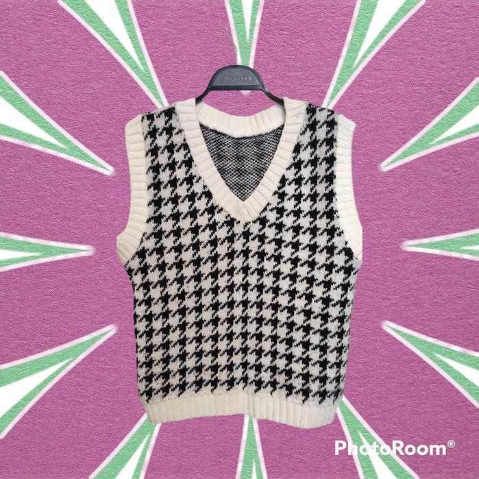 Безрукавка на дівчинку