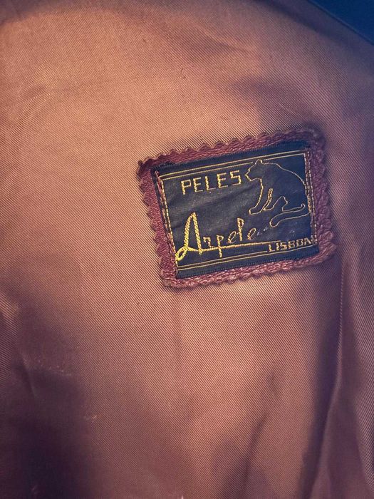 casaco em pele castanho