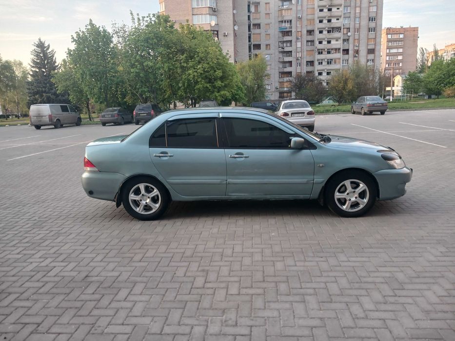 Продам Mitsubishi Lancer.