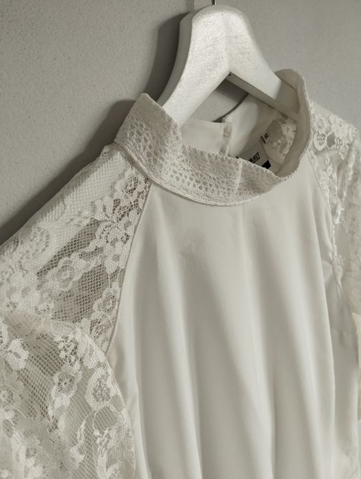 Elegancka bluzka z koronkowym rękawem r. L 40 object