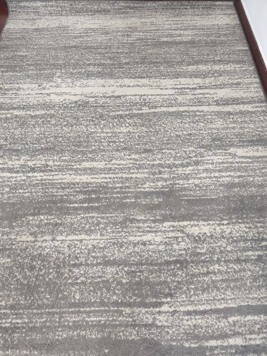 Tapete da sala cinzento