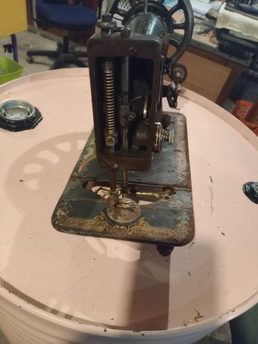 Cabeça de máquina de costura Singer