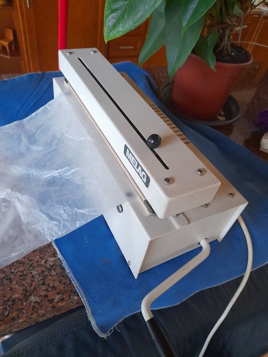 Aparelho para fechar sacos de plastico