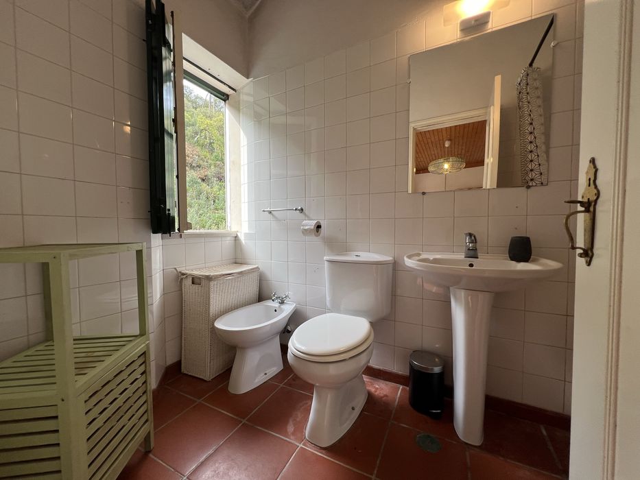 Quarto com casa de banho privativa