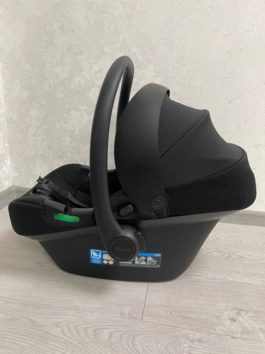 Автокрісло дитяче,як нове.Майже не користувались