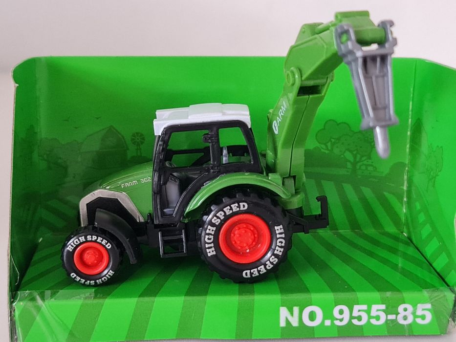 2 zabawkowe modele traktorów z akcesoriami